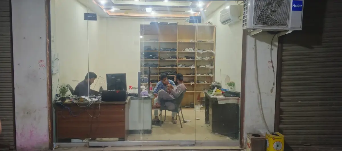 Waqas Battery Care shop front with glass doors